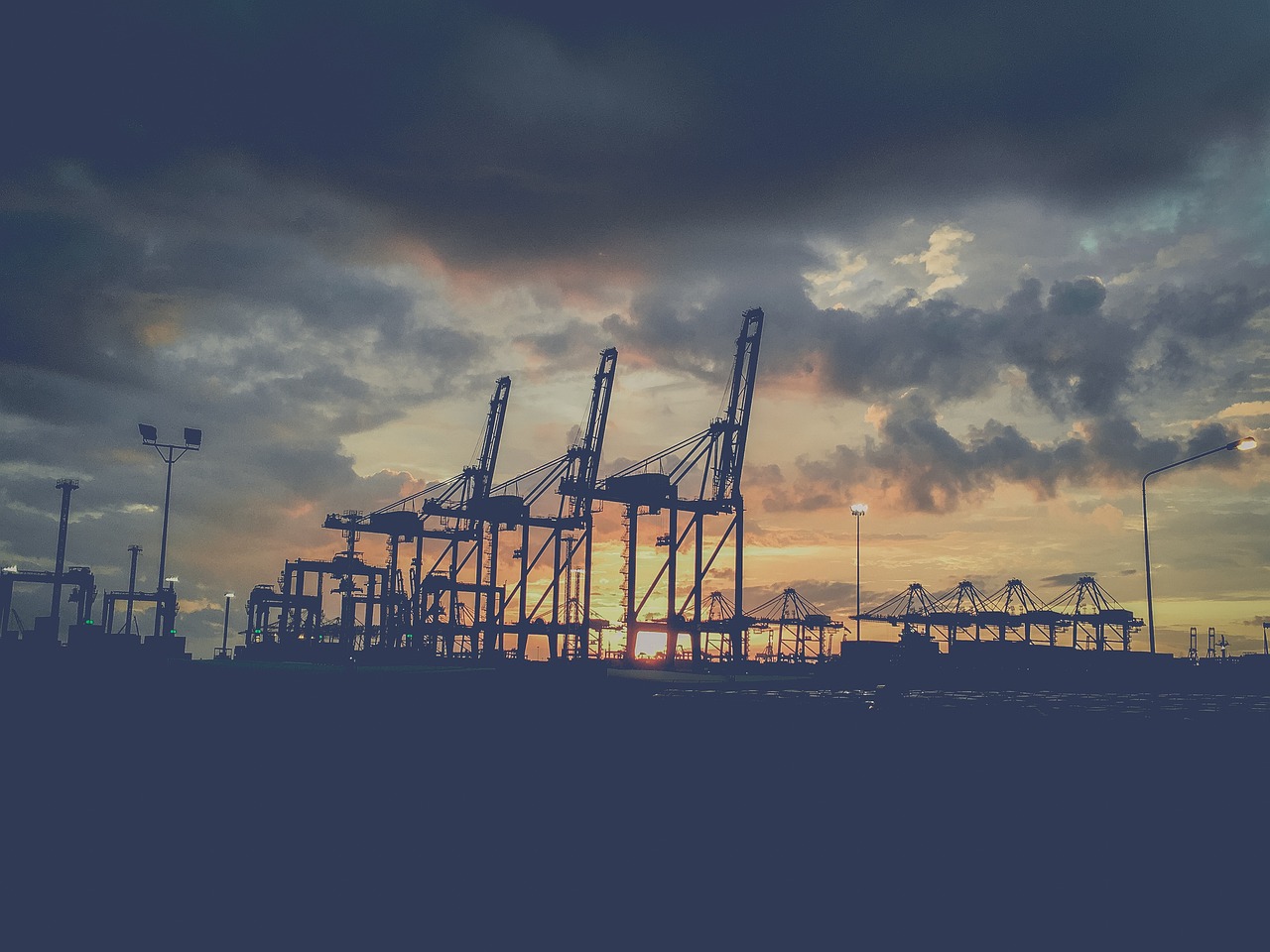Container port in Thailand at sunset